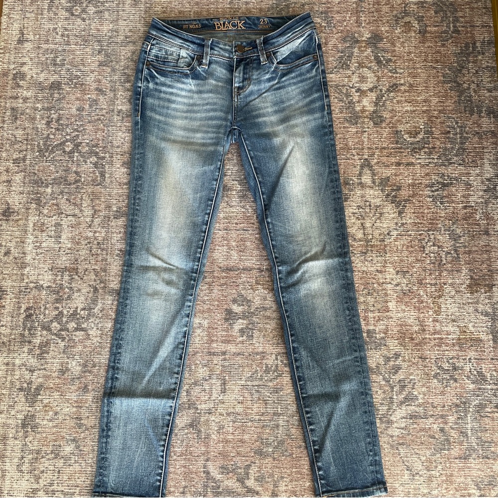Buckle Black Skinny Jeans